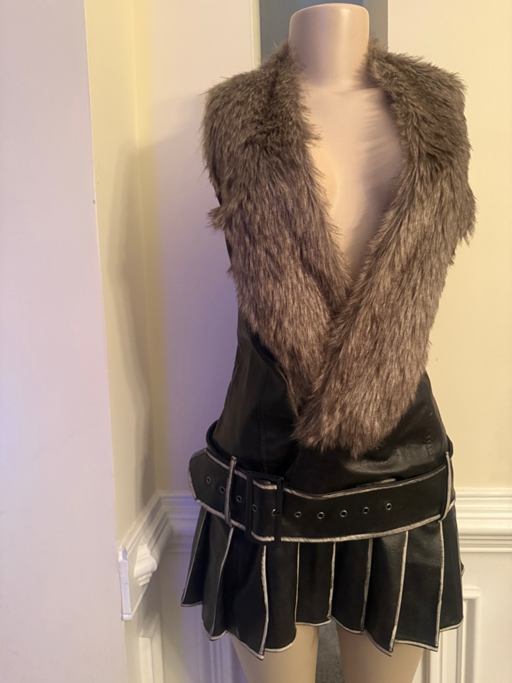 Faux Fur Trim Black Leather Vest with Belted Skirt (one piece)